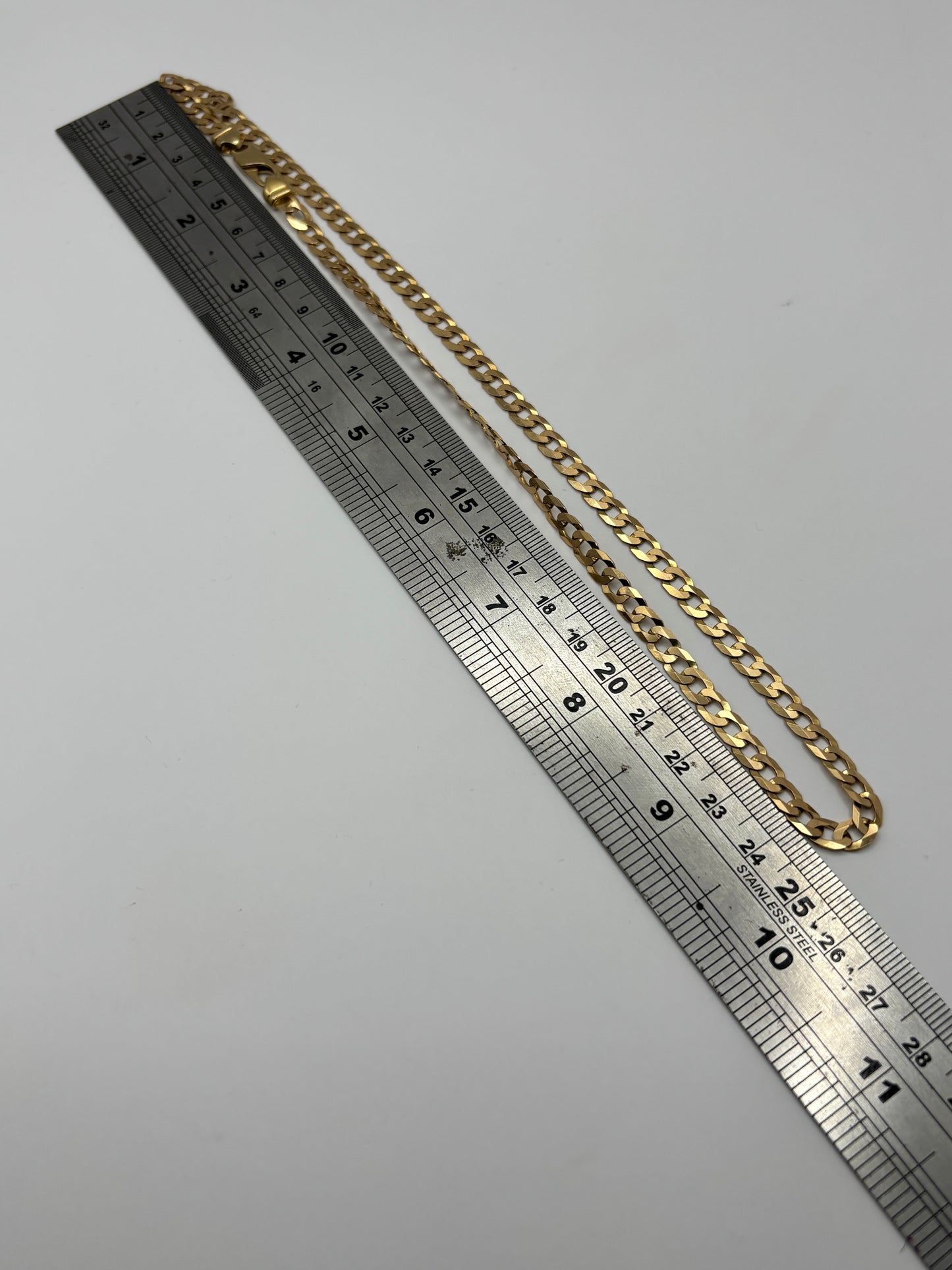9ct Gold Curb Link Chain 50cm long 5.2mm wide. R # 257