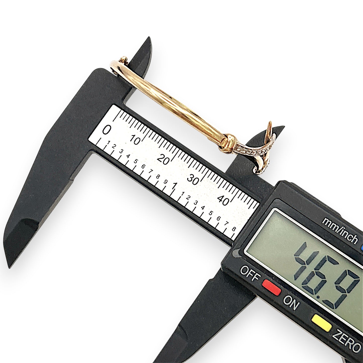 NZGD | 14ct Gold Solitaire Spirit Diamond Bangle Valuation $6,400