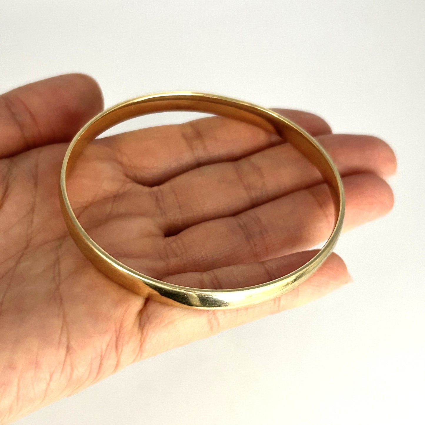 GOLD DEAL | 9ct (9K) Gold Boundless 65.5mm x 6.7mm Solid Bangle Valuation $5,525