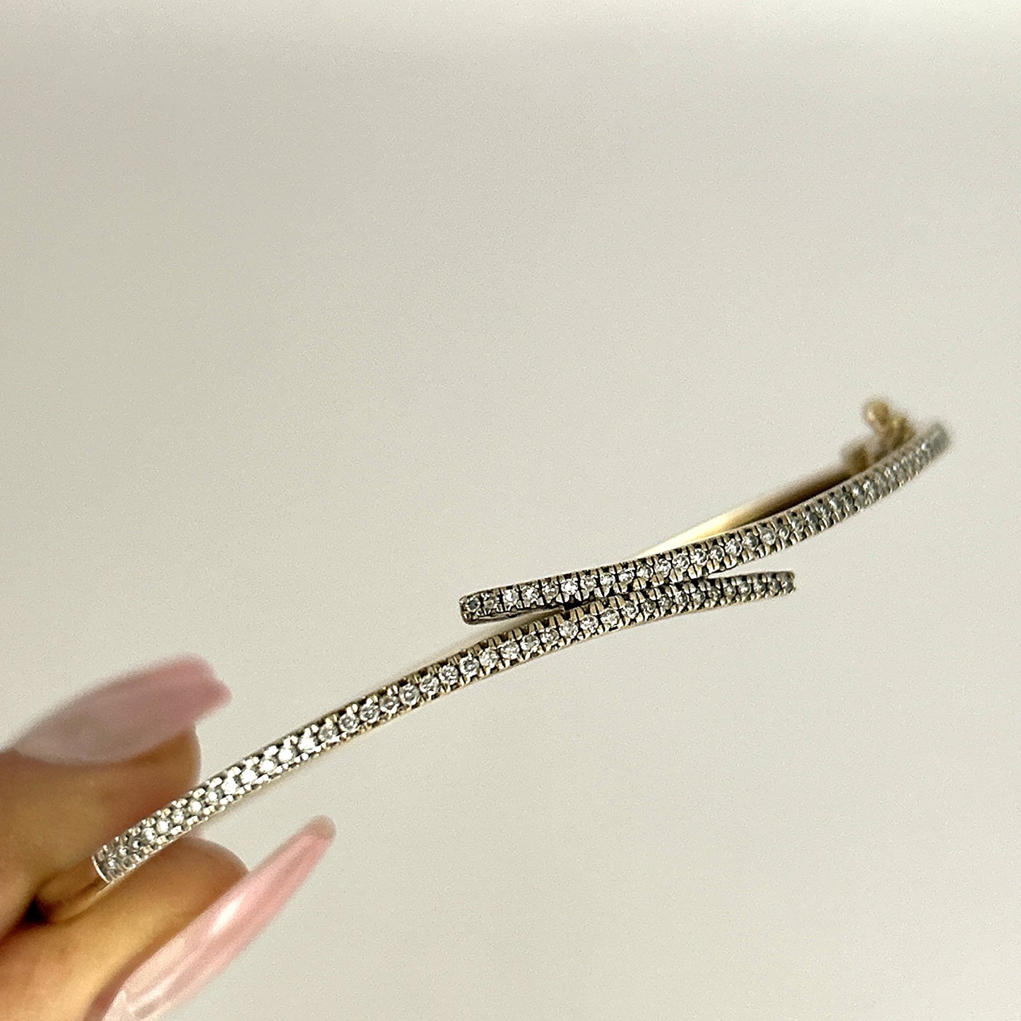 GOLD DEAL | 9ct (9K) Gold Diamond Crosslight Oval Bangle 70.3mm Valuation $4,750