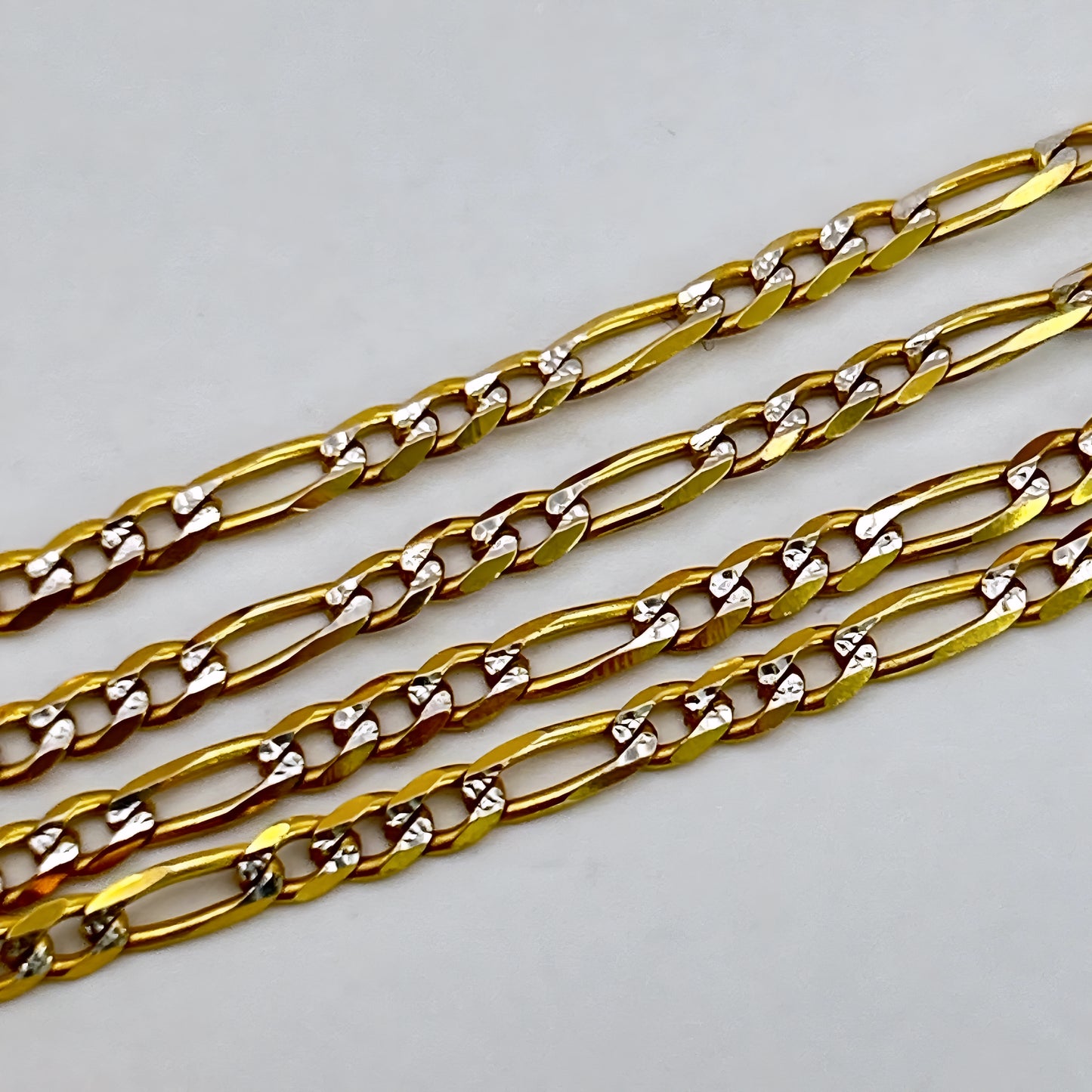 NZGD | 9ct Y/W Gold Link & Luxe – Figaro Bracelet 25cm