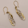 GOLD DEAL | 9kt Y/W Gold Harmony Twist Dangle Earrings