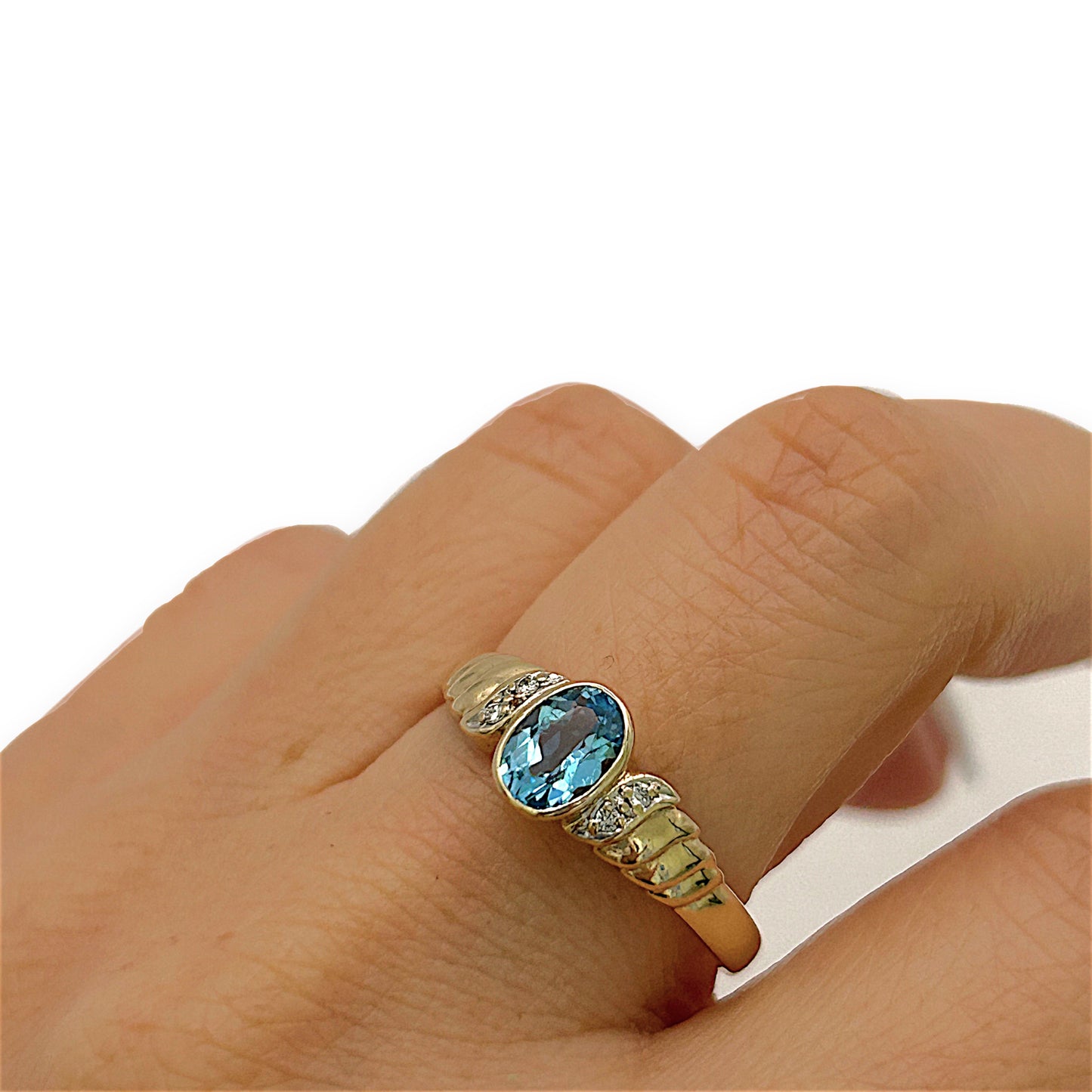 NZGD | 9ct Gold Signature Blue Topaz & Diamond Ring Valuation $1,400