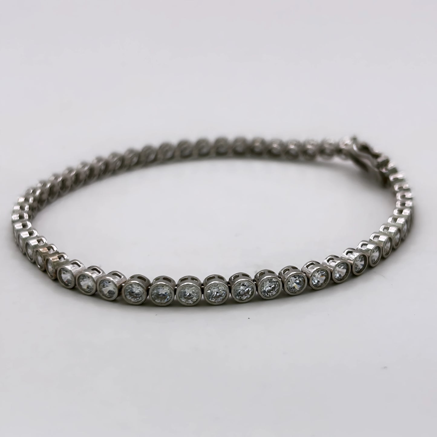 NZGD | 10ct White Gold Celestia Brilliance CZ Tennis Bracelet 21cm