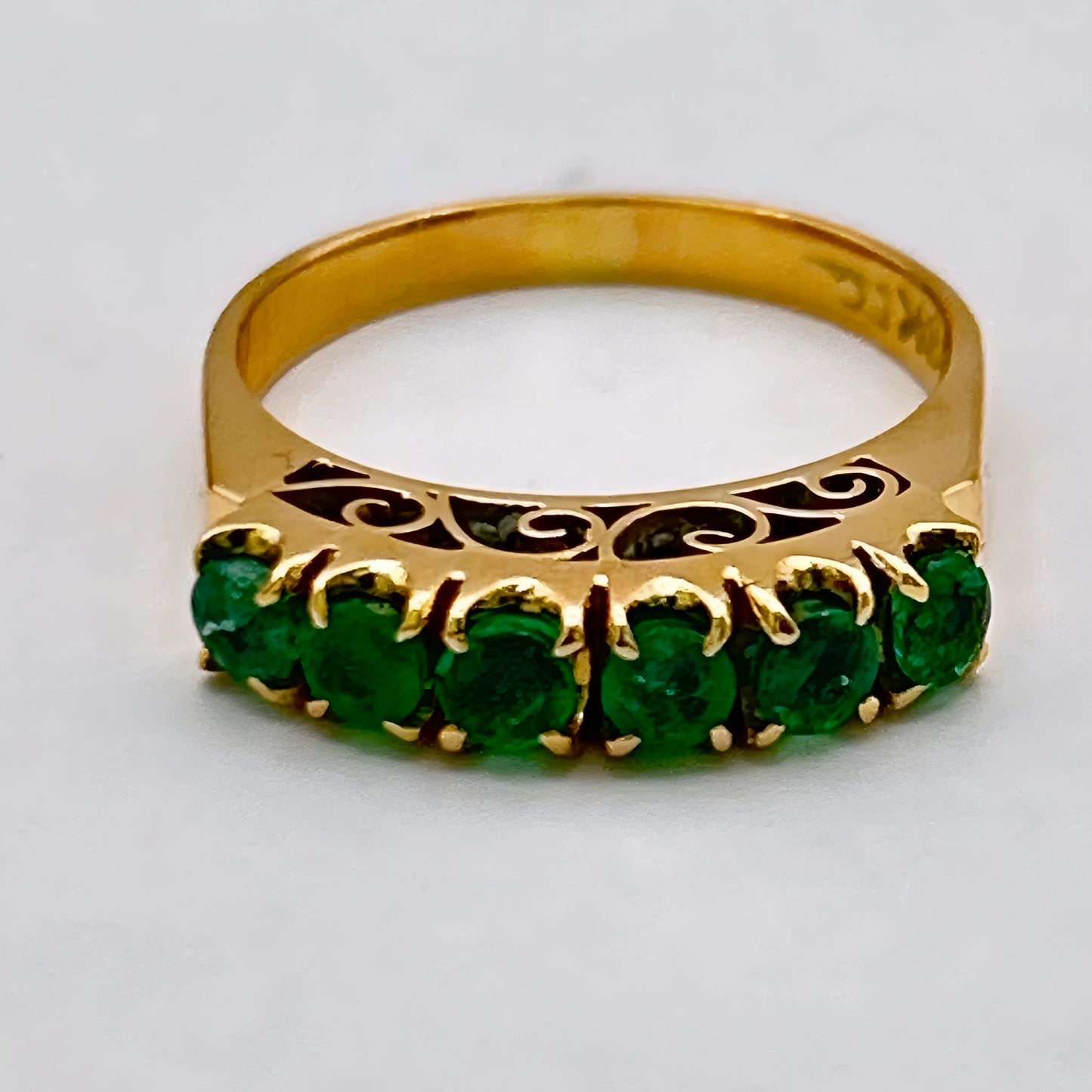 NZGD | 18ct Gold Emerald Horizon BandValuation $4,050