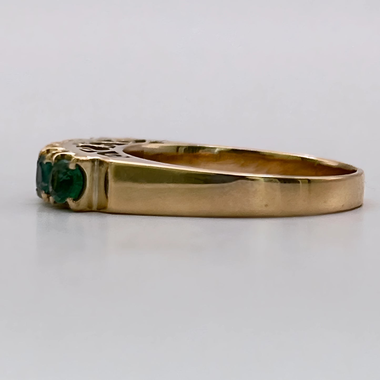 NZGD | 18ct Gold Emerald Horizon BandValuation $4,050