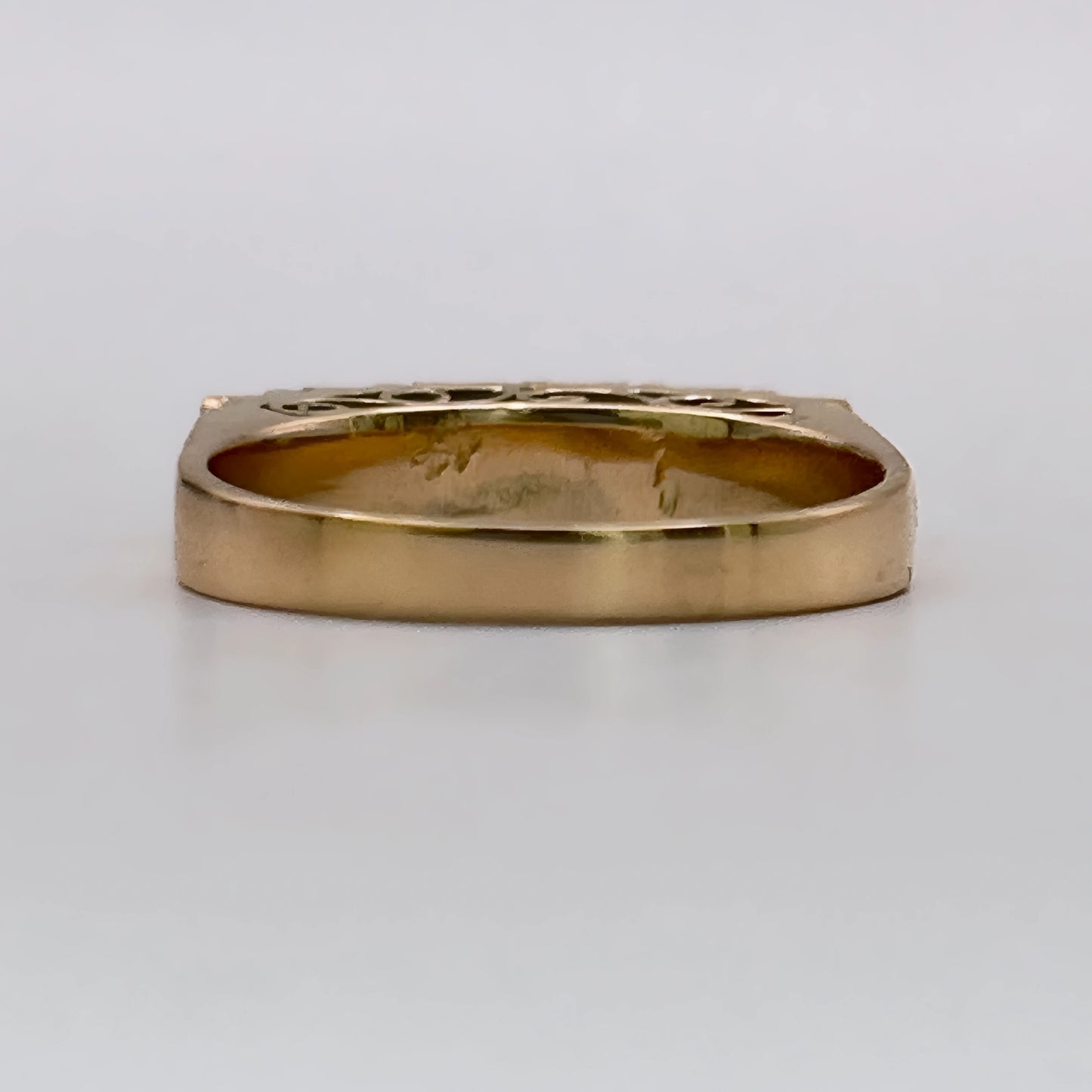 NZGD | 18ct Gold Emerald Horizon BandValuation $4,050