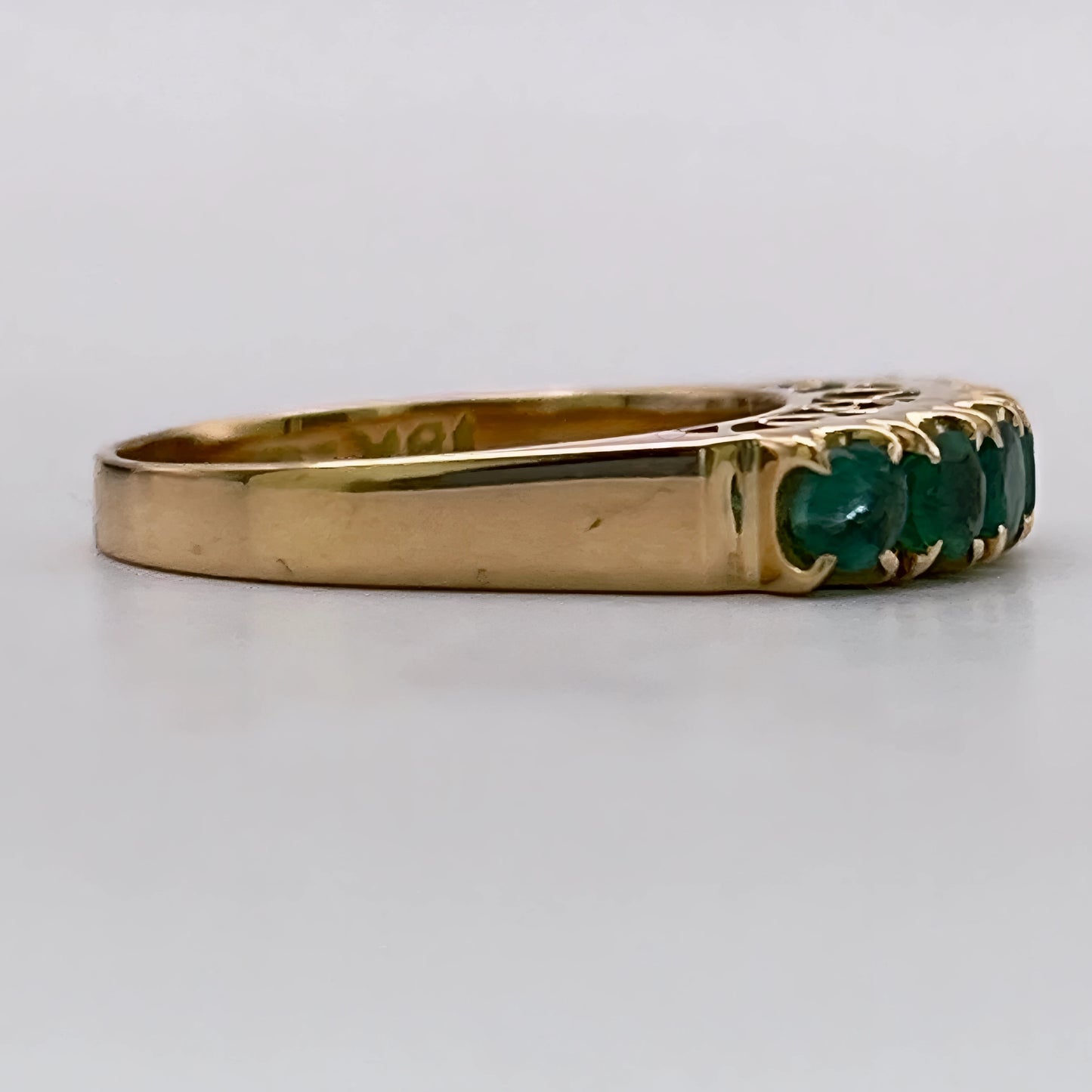 NZGD | 18ct Gold Emerald Horizon BandValuation $4,050