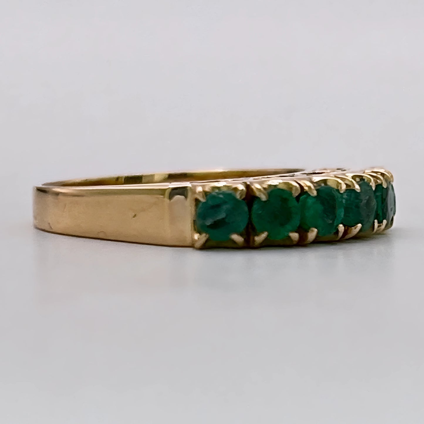NZGD | 18ct Gold Emerald Horizon BandValuation $4,050