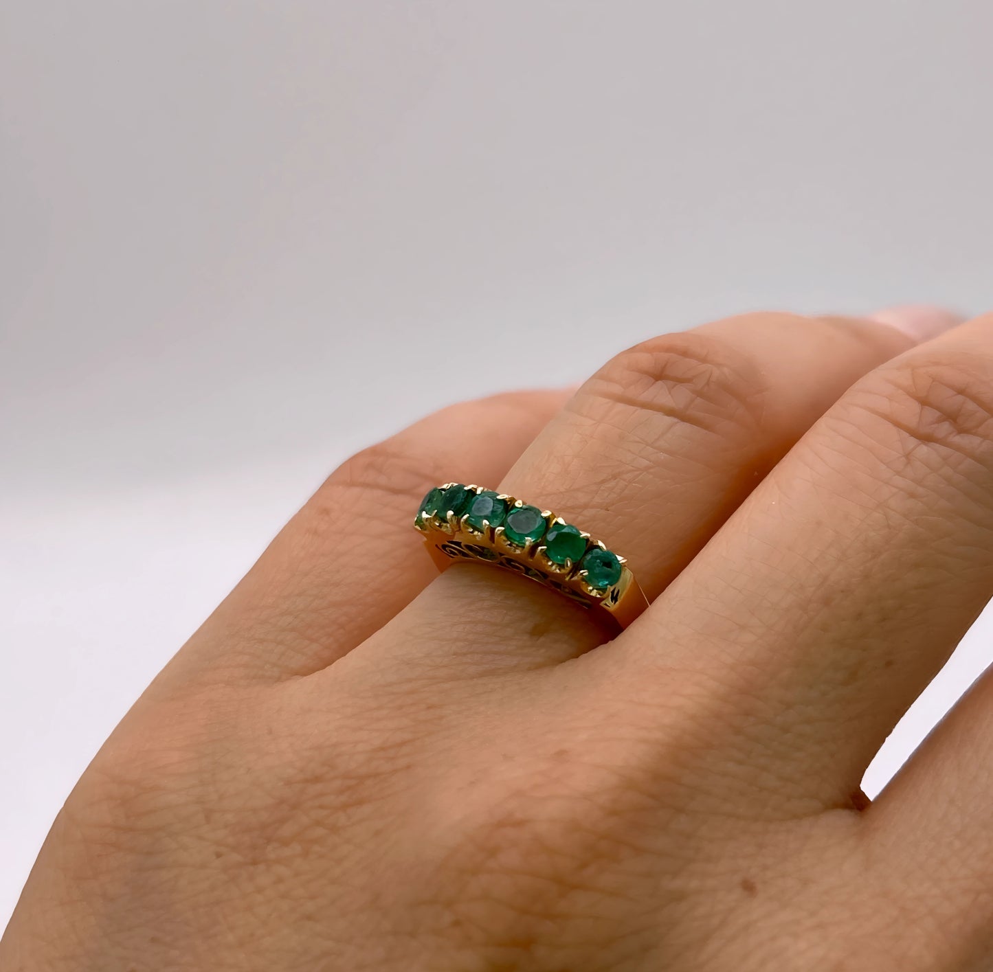 NZGD | 18ct Gold Emerald Horizon BandValuation $4,050