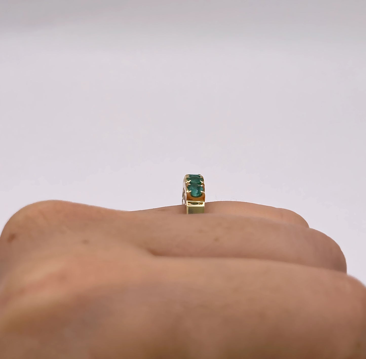 NZGD | 18ct Gold Emerald Horizon BandValuation $4,050
