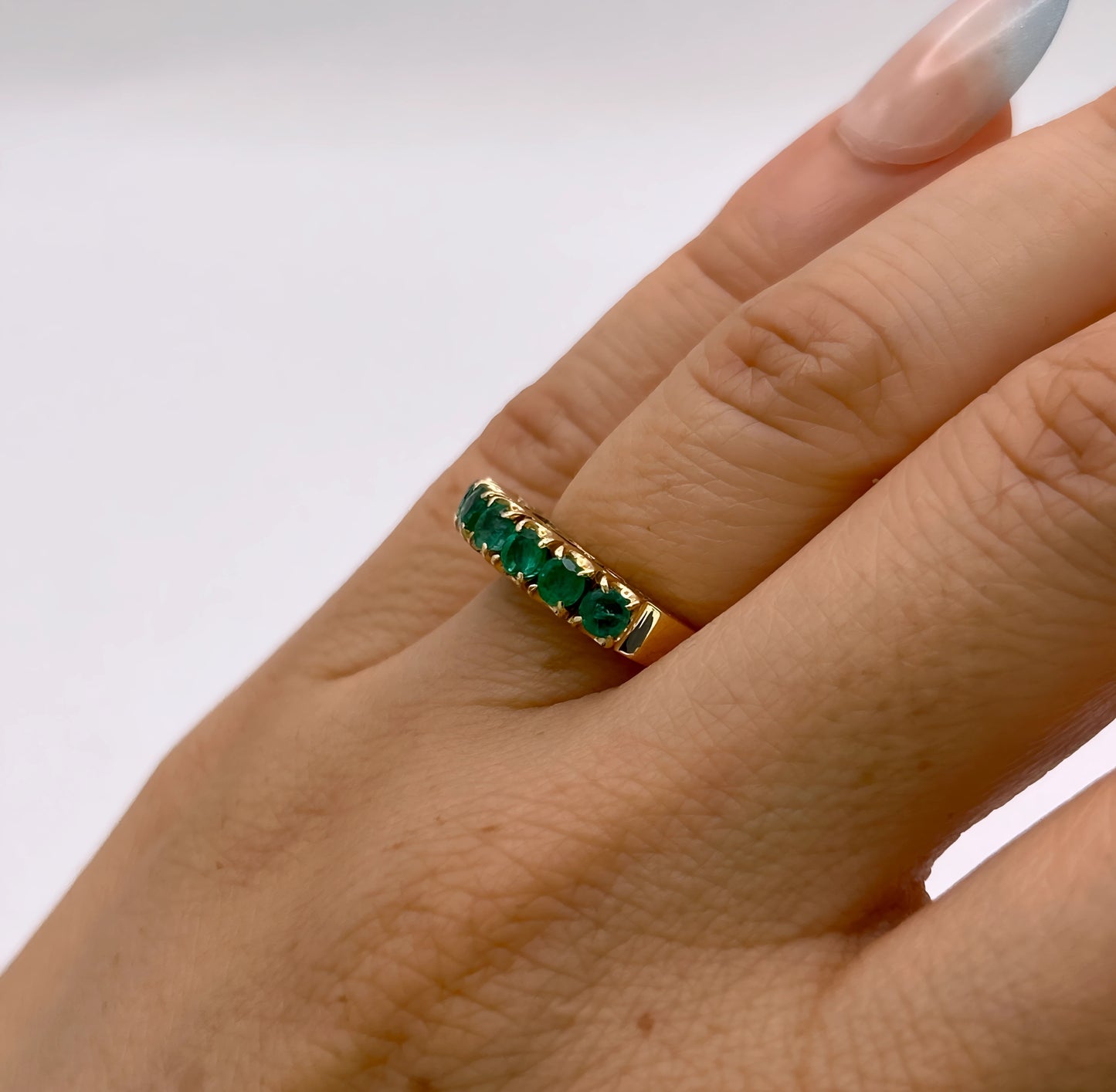 NZGD | 18ct Gold Emerald Horizon BandValuation $4,050