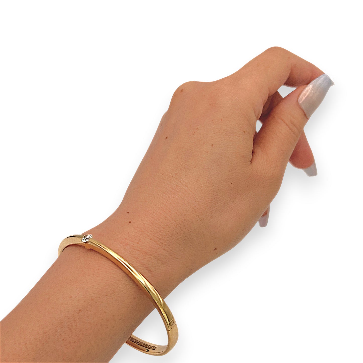 NZGD | 18ct Gold Luminous Solid Arc Bangle Valuation $28,500