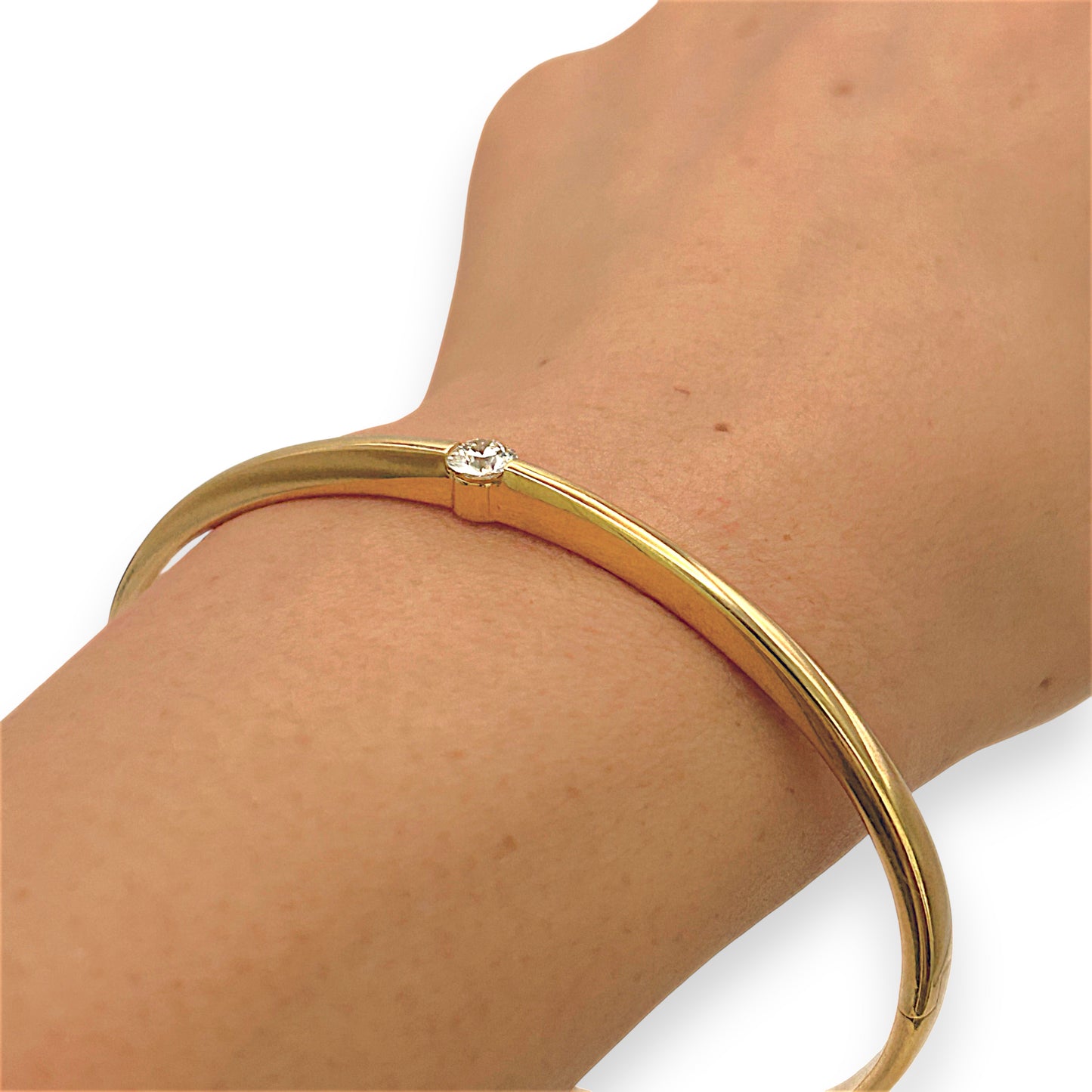 NZGD | 18ct Gold Luminous Solid Arc Bangle Valuation $28,500