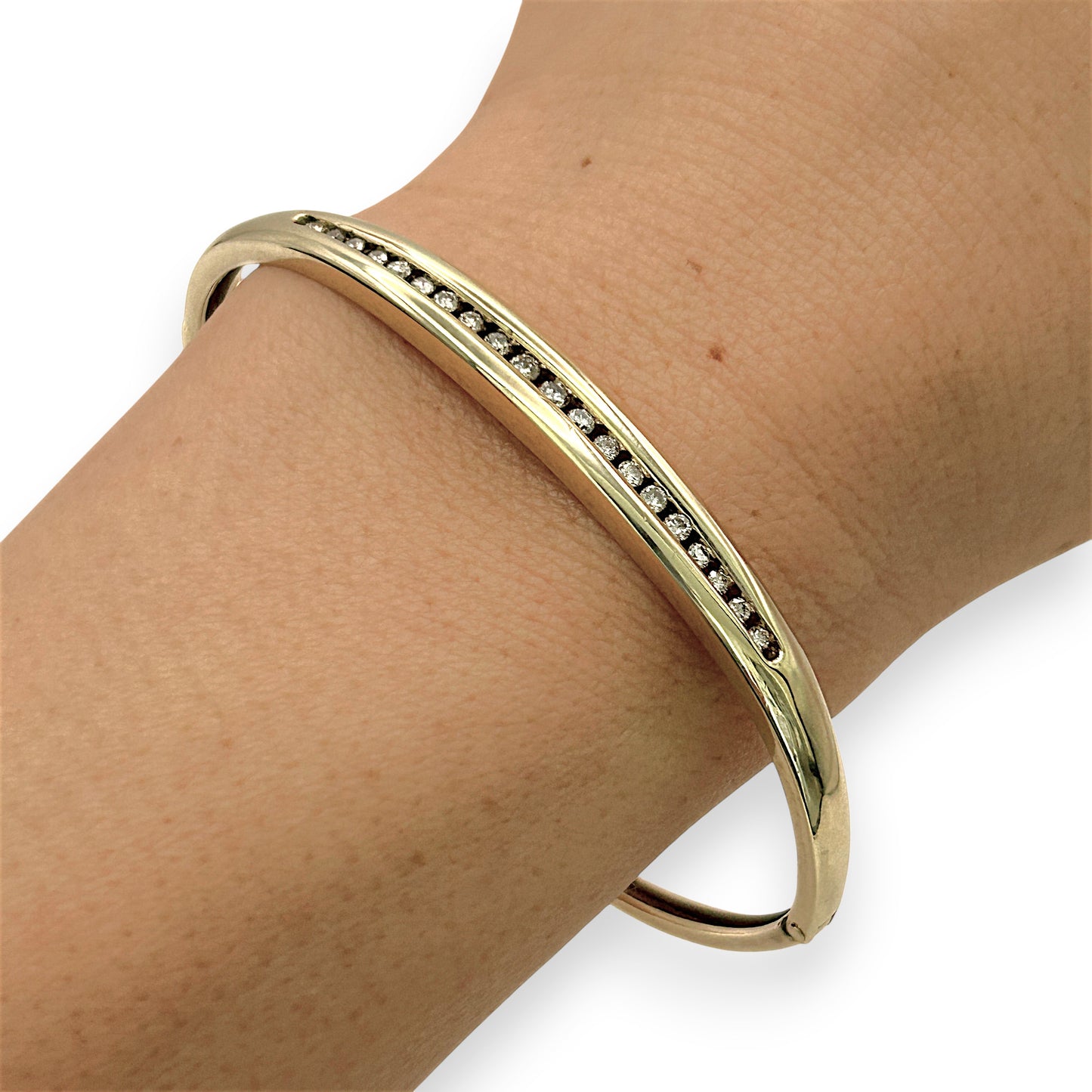 NZGD | 9ct Gold Auric Diamond Oval Bangle Valuation $5,000