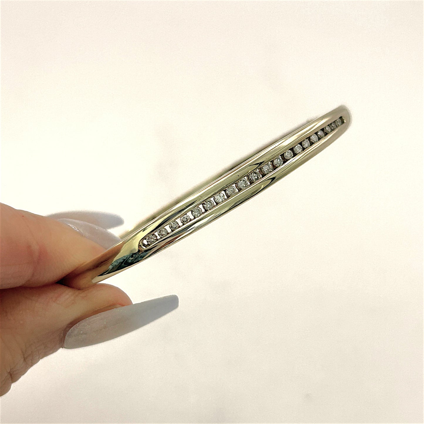 NZGD | 9ct Gold Auric Diamond Oval Bangle Valuation $5,000