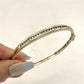 NZGD | 9ct Gold Auric Diamond Oval Bangle Valuation $5,000