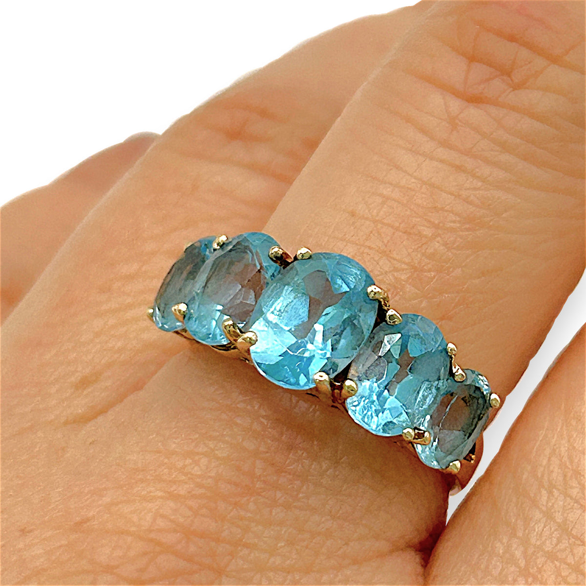 NZGD | 10ct Gold Topaz Symphony Ring Valuation $1,250