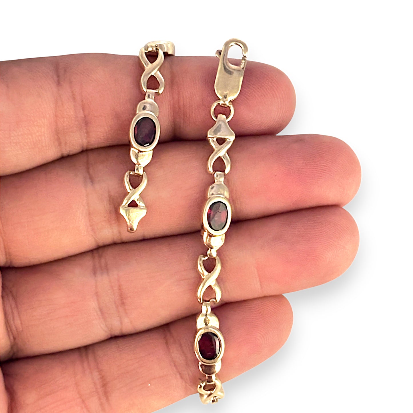 9ct Gold Crossover Link Bracelet with Red Stones. R # 743