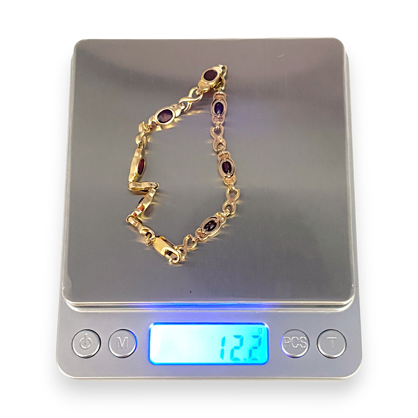 9ct Gold Crossover Link Bracelet with Red Stones. R # 743