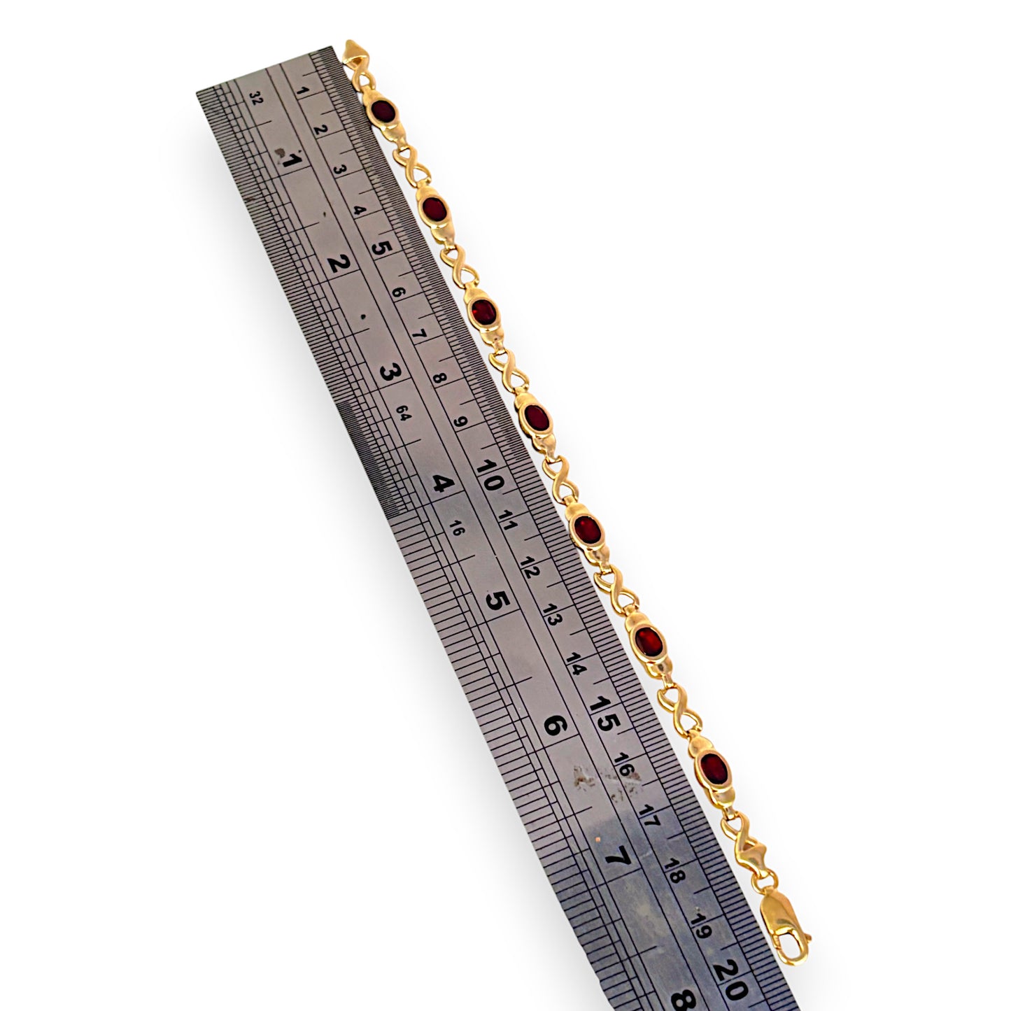 9ct Gold Crossover Link Bracelet with Red Stones. R # 743